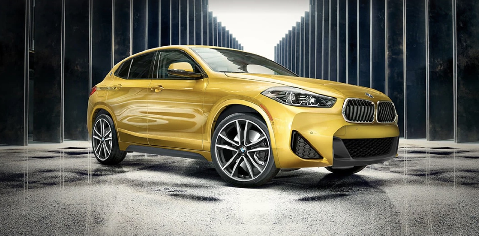 2022 BMW X2 parked in front of a modern building
