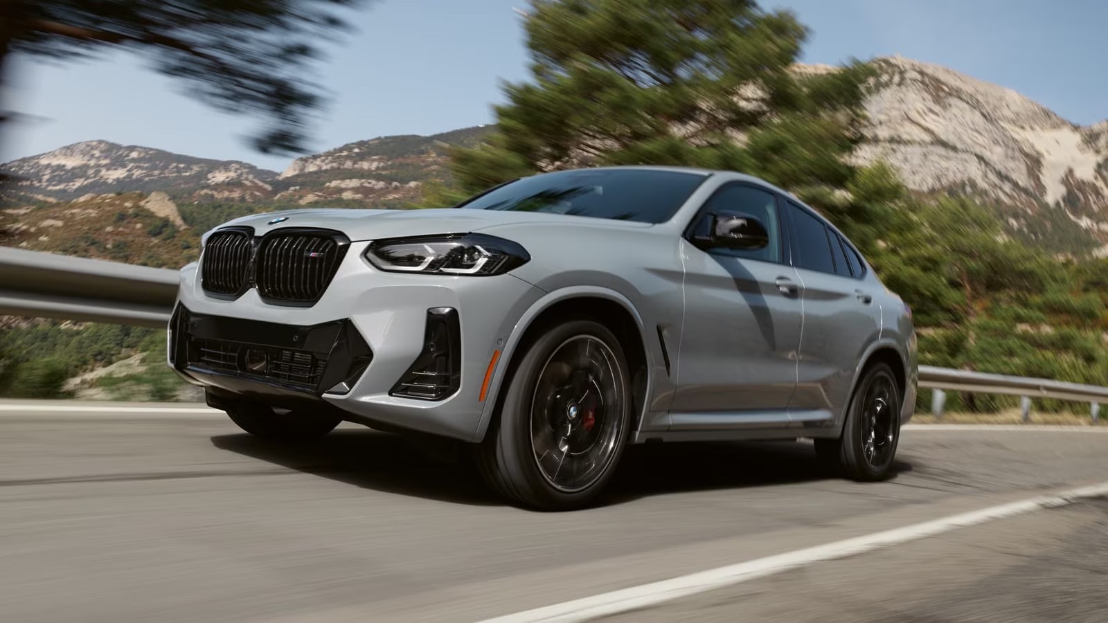 The new 2023 BMW X4 driving on the highwat