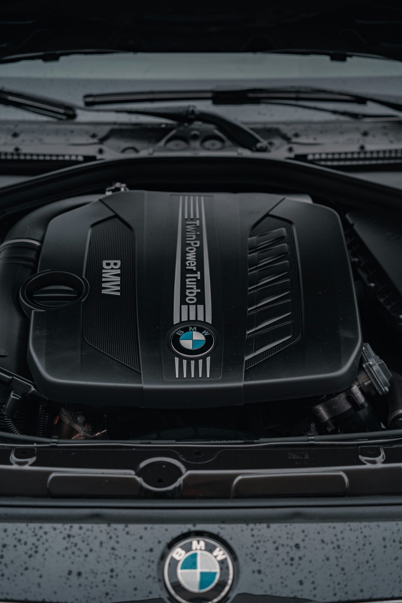 Under the hood of a BMW vehicle, looking at the turbo-twin power engine