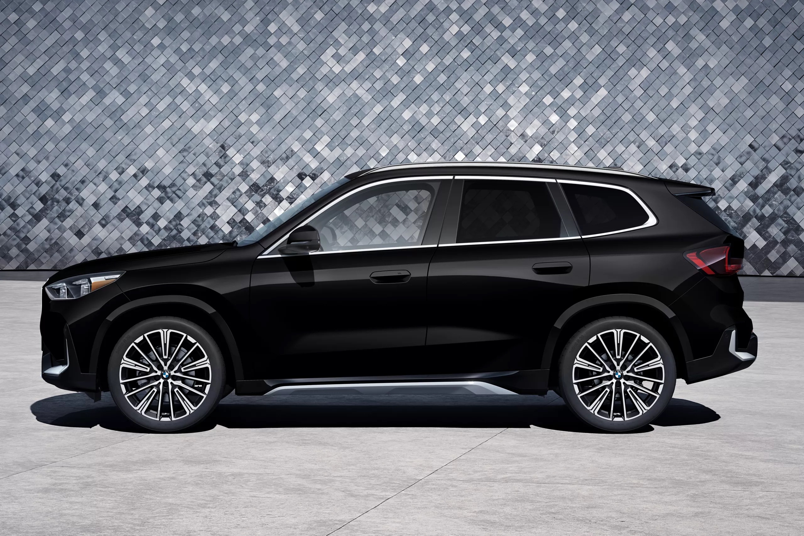 A black 2026 BMW X1 parked in Rockford, IL