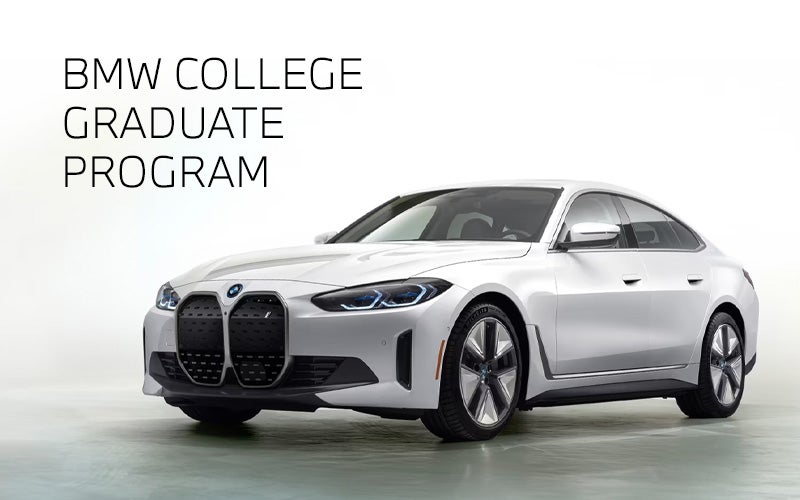 White BMW i4 parked. BMW College Graduate Program. | Bachrodt BMW in Rockford IL