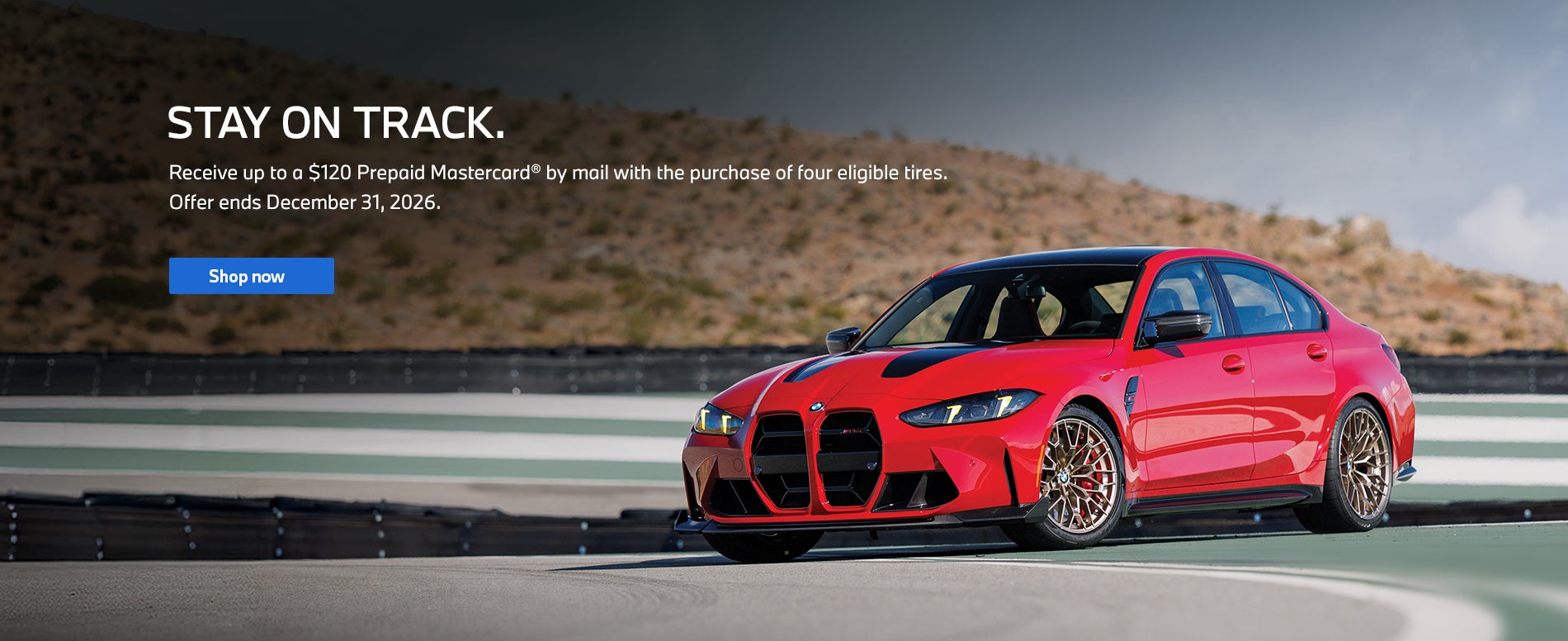 Red BMW driving around a racetrack curve, painted with green