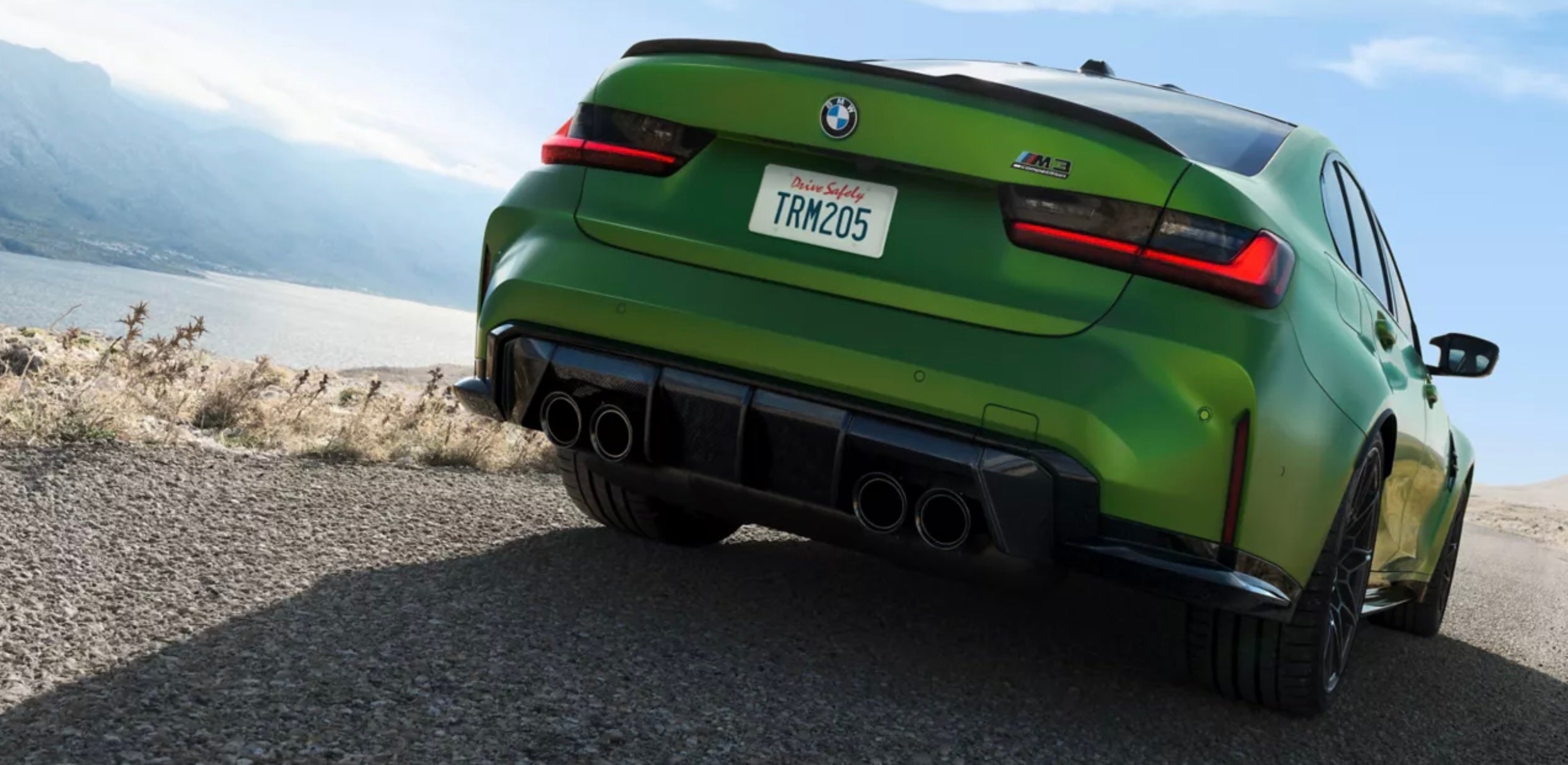 2026 BMW M3 Competition in green - Exterior side view